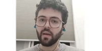Calebe Guerra mora em Wuhan h&aacute; um ano e meio e faz parte de grupo de brasileiros que pede para governo brasileiro tir&aacute;-los da cidade  Foto: Skype/Reprodu&ccedil;&atilde;o / BBC News Brasil