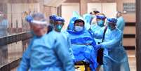 Paciente suspeito de caso do coronavírus é transferido em hospital em Hong Kong
23/01/2020
cnsphoto via REUTERS  Foto: Reuters