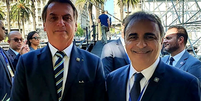 Ricardo Merlo com Jair Bolsonaro na posse de Lacalle Pou  Foto: Divulga&ccedil;&atilde;o / Ansa - Brasil
