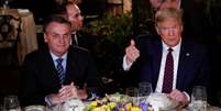 Trump participa de jantar com Bolsonaro em Palm Beach, Flórida  Foto: Tom Brenner / REUTERS