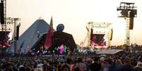 Por-do-sol atrás do palco Pyramid durante Festival de Glastonbury em Somerset, Reino Unido
28/06/2019
REUTERS/Henry Nicholls  Foto: Reuters