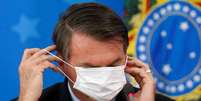 Presidente Jair Bolsonaro voltou a chamar a Covid-19 de "gripezinha" em discurso
18/03/2020
REUTERS/Adriano Machado  Foto: Reuters