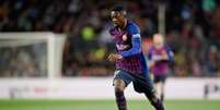 Dembélé está tratando lesão para voltar a jogar nesta temporada (Foto: AFP)  Foto: LANCE!