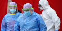 Profissionais de saúde durante epidemia de coronavírus na Alemanha
15/04/2020 REUTERS/Matthias Rietschel  Foto: Reuters
