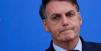 Bolsonaro em coletiva após demissão de Mandetta; para analistas ouvidos pela reportagem, presidente já não tem forças para mudar o rumo do país na condução de pandemia  Foto: REUTERS/Adriano Machado / BBC News Brasil