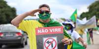 Apoiadores do presidente da República, Jair Bolsonaro, se concentram em ato diante do Comando Militar do Nordeste (CMNE), no Recife (PE)  Foto: RODRIGO BALTAR / AGÊNCIA PIXEL PRESS/ESTADÃO CONTEÚDO