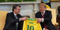 Jair Bolsonaro e Donald Trump durante reunião na Casa Branca, em março de 2019  Foto: ANSA / Ansa