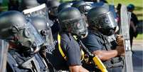 A proteção legal contra acusação para policiais é uma questão altamente controversa  Foto: EPA / BBC News Brasil