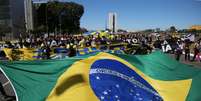 Manifestantes contrários ao presidente da República, Jair Bolsonaro, participam de manifestação na Esplanada dos Ministérios, em Brasília, na manhã deste domingo, 21  Foto: EDU ANDRADE/FATOPRESS/ESTADÃO CONTEÚDO / Estadão