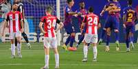 Rakitic celebra o gol que garantiu a sofrida vitória do Barcelona sobre o Bilbao, que valeu a ponta provisória (AFP)  Foto: Lance!