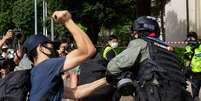 Confronto durante protesto em Hong Kong  Foto: AFP / Ansa - Brasil