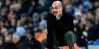 Guardiola mostra cautela antes do jogo contra o Real Madrid (Foto: LINDSEY PARNABY / AFP)  Foto: Lance!