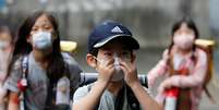 Crianças usam máscaras de proteção durante pandemia de Covid-19 em Funabashi, no Japão
16/07/2020 REUTERS/Kim Kyung-Hoon  Foto: Reuters