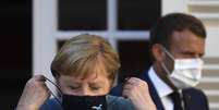 Merkel e Macron se reuniram na França nesta quinta  Foto: EPA / Ansa - Brasil