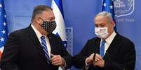 Secretário de Estado dos EUA, Mike Pompeo, e premiê de Israel, Benjamin Netanyahu 
24/08/2020
Debbie Hill/Pool via REUTERS  Foto: Reuters