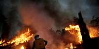 Bombeiros lutam contra incêndio na floresta amazônica, em Apuí (AM)
11/08/2020
REUTERS/Ueslei Marcelino  Foto: Reuters