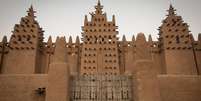 As mudanças climáticas têm reduzido a disponibilidade de adobe de alta qualidade para construções históricas em Djenné, no Mali  Foto: Getty Images / BBC News Brasil