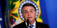 'Quando eu indico qualquer pessoa para qualquer local, eu sei que é uma boa pessoa, tendo em vista a quantidade de críticas que ela recebe em grande parte da mídia', provocou Bolsonaro  Foto: REUTERS/Ueslei Marcelino / BBC News Brasil