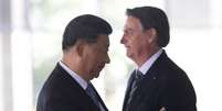 Bolsonaro e o presidente chinês, Xi Jinping, se cumprimentam em Brasília, em cúpula do Brics em 2019
14/11/2019
REUTERS/Adriano Machado  Foto: Reuters