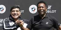 Pelé e Maradona juntos em evento (Foto: AFP)  Foto: Lance!