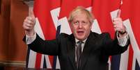 Premiê Boris Johnson assina acordo do Brexit com UE
 30/12/ 2020 Leon Neal/Pool via REUTERS     Foto: Reuters