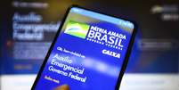 A Caixa quer abrir o capital de seu banco digital, criado para fazer o pagamento do aux&iacute;lio emergencial.  Foto: Marcelo Camargo/Ag&ecirc;ncia Brasil / Estad&atilde;o Conte&uacute;do