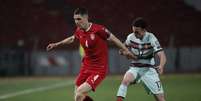 Sérvia e Portugal empataram em partida de quatro gols (Foto: PEDJA MILOSAVLJEVIC / AFP)  Foto: Lance!