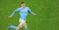 Phil Foden marcou o gol da virada sobre o Borussia Dortmund na Champions (Foto: WOLFGANG RATTAY / AFP / POOL)  Foto: Lance!