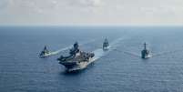 Navios das Marinhas dos Estados Unidos e da Austrália no Mar do Sul da China
18/04/2020 Oficial de 3ª Classe Nicholas Huynh/Marinha dos EUA/Divulgação via REUTERS  Foto: Reuters