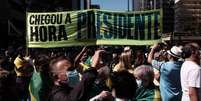 Manifestação na Avenida Paulista, em São Paulo, em favor do presidente Bolsonaro pede a intervenção militar  Foto: Ettore Chiereguini/Agif - Agência de Fotografia / Estadão Conteúdo