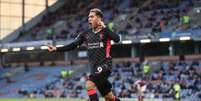 Firmino tem nove gols pelo Liverpool na temporada (Foto: MARTIN RICKETT / POOL / AFP)  Foto: Lance!