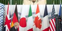 Bandeiras dos pa&iacute;ses do G7 no gabinete do primeiro-ministro brit&acirc;nico durante c&uacute;pula online de fevereiro
19/02/2021
Geoff Pugh/Pool via REUTERS  Foto: Reuters