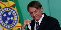 Jair Bolsonaro voltou a atacar as vacinas  Foto: Adriano Machado / Reuters