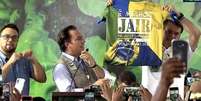 O presidente Jair Bolsonaro exibe camiseta com a frase 'É melhor Jair se acostumando. Bolsonaro 2022' no Pará, nesta sexta, 18   Foto: PRESIDÊNCIA DA REPÚBLICA / Estadão Conteúdo