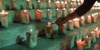 Velas são acesas no Rio de Janeiro para marcar 500 mil mortes do Covid
 21/6/2021 REUTERS/Pilar Olivares  Foto: Reuters