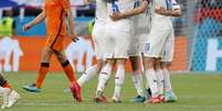 Jogadores da seleção holandesa comemoram vitória na Eurocopa  Foto: Bernadett Szabo / Reuters