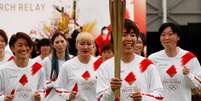 Revezamento da tocha olímpica em Naraha, na região de Fukushima, no Japão
25/03/2021 REUTERS/Kim Kyung-Hoon/Pool  Foto: Reuters