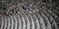 Estádio Nacional de Tóquio chegou a receber eventos-testes com público (Foto: CHARLY TRIBALLEAU / AFP)  Foto: Lance!