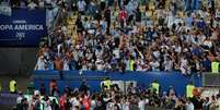 Jogadores e torcedores argentinos festejam título da Copa América  Foto: Henry Romero / Reuters