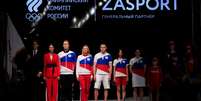 Modelos apresentam uniformes da equipe olímpica da Rússia, que não pode competir sob a bandeira do país em Tóquio  Foto: Evgenia Novozhenina/Reuters