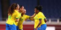 Andressa Alves comemora com jogadoras do Brasil gol marcado contra a Zâmbia na Olimpíada de Tóquio 2020
27/07/2021 REUTERS/Molly Darlington  Foto: Reuters