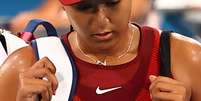 Desolada, Naomi Osaka deixa a quadra depois de ser eliminada nas oitavas de final  Foto: Mike Segar/Reuters