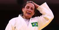 Maria Portela chorou muito depois da derrota nesta quarta-feira  Foto: Reuters / BBC News Brasil