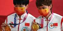 A dupla chinesa venceu a Alemanha e a Rússia na disputa pelo ouro olímpico  Foto: Getty Images / BBC News Brasil