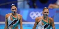 Integrantes da equipe de nado artístico da Grécia durante apresentação nos Jogos de Tóquio  Foto: Marko Djurica/Reuters
