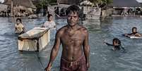 Villagers in Kiribati affected by flooding  Foto: Getty Images / BBC News Brasil