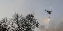 Grande incêndio irrompe ao norte de Atenas, Grécia
04/08/2021 REUTERS/Costas Baltas  Foto: Reuters