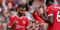 Bruno Fernandes e Pogba foram os responsáveis por vitória do Manchester United (ADRIAN DENNIS / AFP)  Foto: Lance!