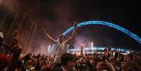 Comemoração de torcedores italianos no estádio de Wembley, em Londres
 11/7/2021 Action Images via Reuters/Lee Smith  Foto: Reuters
