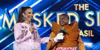 Marcelinho Carioca foi eliminado do The Masked Singer  Foto: Globo/Kelly Fuzaro